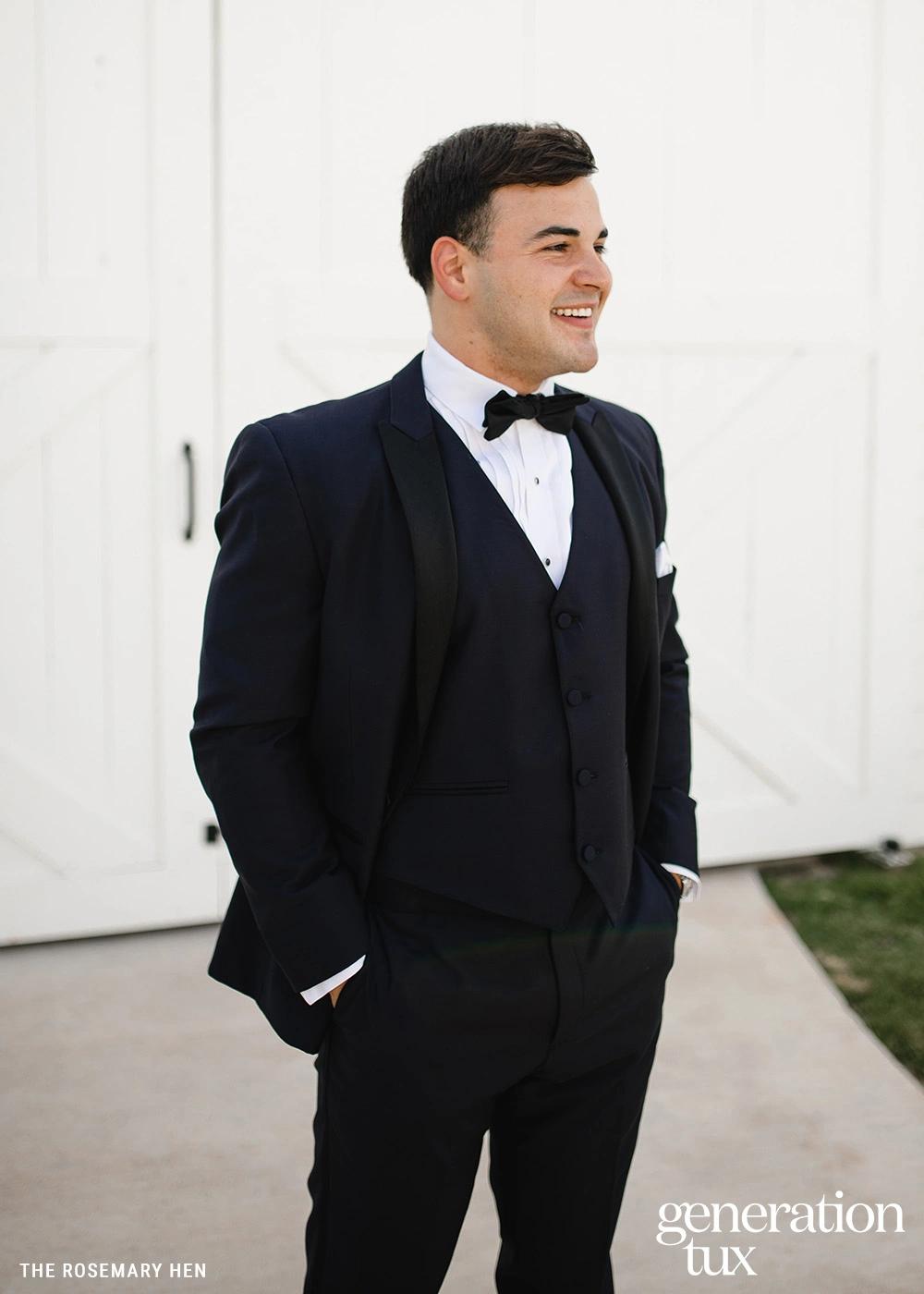 model in black tux